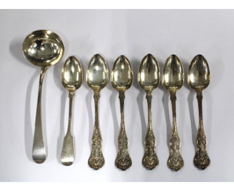 Georgian silver sauce ladle, London 1807, a Victorian silver teaspoon, Edinburgh 1844 and five silver Queens pattern teaspoon
