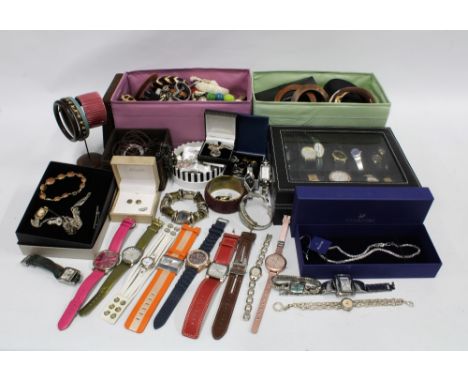 A quantity of silver and costume jewellery to include Thomas Sabo, Swarovski, Sheila Fleet and others with a collection of la