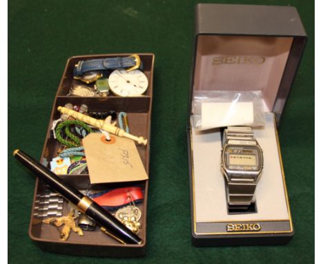 A quantity of watches, enamelled badges, a bobbin and a silver brooch, etc