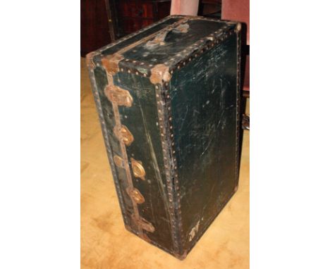 A blue travel trunk