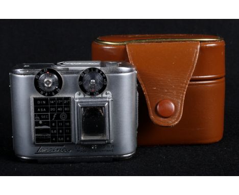 A Tessina automatic sub miniature 35mm camera numbered 64935, in brown leather case