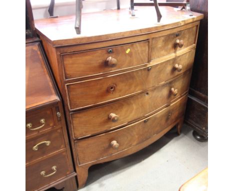 A 19th Century mahogany bowfront chest of two short and three long drawers, on cut away bracket supports