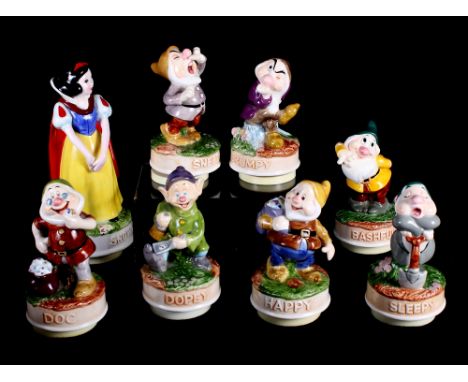A set of Schmidt ceramic figures of Snow White and the Seven Dwarfs, bases fitted musical boxes, and a collection of decorati