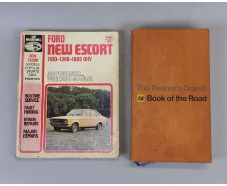 Ford Escort manual together with AA book of the road 