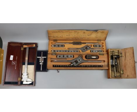 4 cased engineers tools to include Vernier depth gauge, Vernier calliper engineers tap and die set and engineers scribing blo