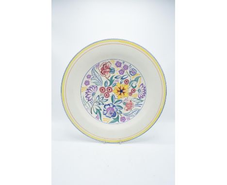 Large Poole Pottery floral charger, 39cm diameter. In good condition with no obvious damage or restoration. Some surface wear