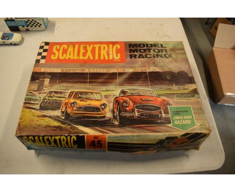 Boxed Scalextric set 45 1960s with paperwork. Untested. 