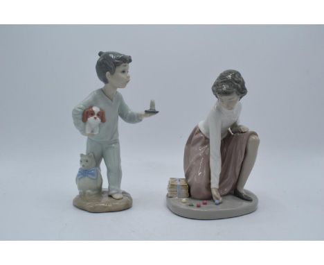 Nao by Lladro Boy with Candle 1138 and a Schoolchild playing Marbles (2). In good condition with no obvious damage or restora