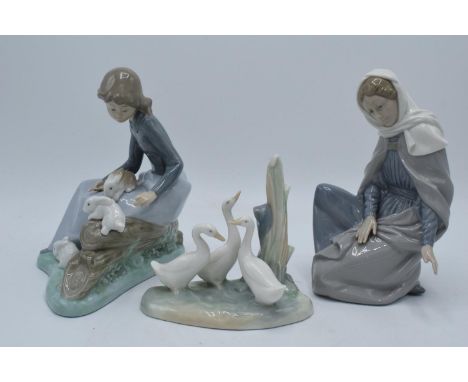 Nao by Lladro girl with rabbits 1026, geese scene and a lady (3). In good condition with no obvious damage or restoration. La