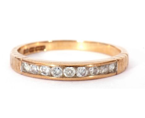 9ct gold diamond half hoop ring featuring nine round channel set small brilliant cut diamonds, size K
