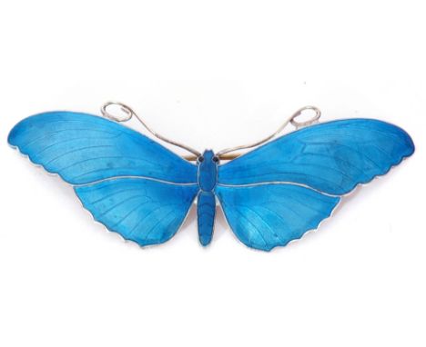 Sterling and enamel large butterfly brooch, the outstretched wings and body enamelled in a blue guilloche design, 8cm wide