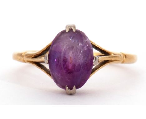 18ct stamped amethyst ring, cardinal set and raised between openwork shoulders, size K/L