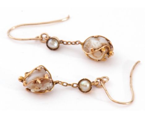 Pair of antique baroque pearl drop earrings, each with a boulder shape pearl in a beaded strap design frame, suspended below 