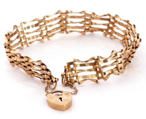 Modern 9ct gold gate bracelet, five bar design with heart padlock and safety chain fitting, 6gms