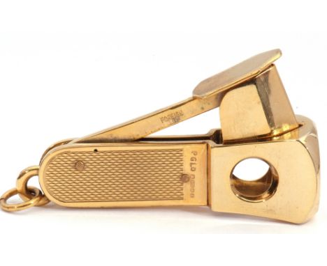 Late 20th century hallmarked 9ct gold encased cigar cutter with engine turned grips and ringlet hanger, 5.5cm long, Birmingha