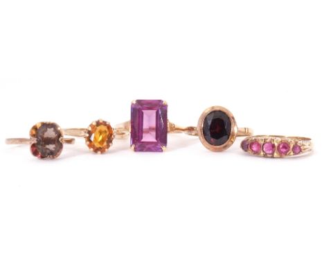 Mixed Lot: five 9ct gold rings, a five stone small ruby ring, garnet, citrine, and quartz examples, together with a purple co