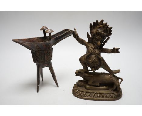 A Buddhist bronze figure and a bronze yi vessel, figure 22cm high