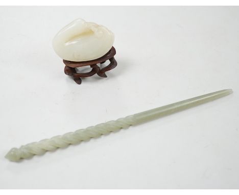 Two Chinese jades, and a wooden stand, largest jade 17.5 cm long