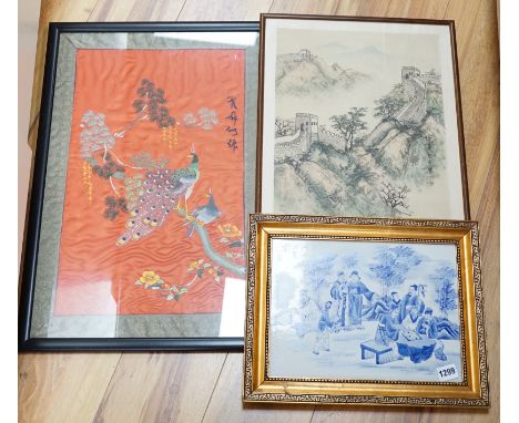 A Chinese porcelain figural panel and orange silk embroidered panel and a silk painted panel, figural panel 30cm wide, 22.5cm