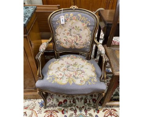A Louis XVI style tapestry upholstered fauteuil, width 57cm, depth 45cm, height 89cm