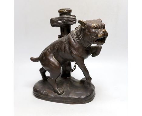 After Mene. A bronze of a pit bull dog chained to a post, 33cm high