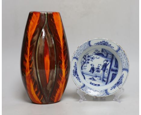 A ‘Delphis’ Poole pottery vase and a Delft bowl, vase 26cm high