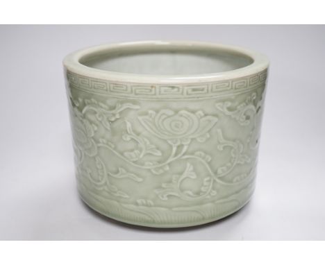 A Chinese celadon glazed tripod brushpot, 19th century Provenance - UK private collection, 1920s or earlier, thence by family