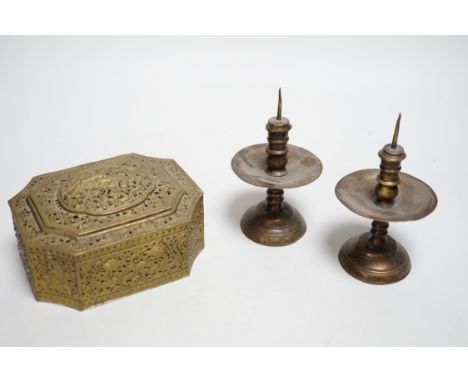 A pair of Middle Eastern bronze pricket candlesticks and an Indian pierced brass casket,  candlesticks 14cm high