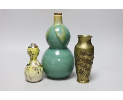 A Japanese bronze faux bois vase, a Satsuma vase and a porcelain tokkuri, a faux bois vase 15cm high (3)