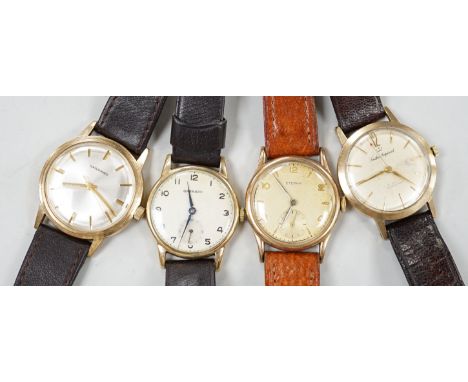 Two gentleman's 9ct gold manual wind wrist watches, retailed by Garrards, both with engraved inscription and two other 9ct go