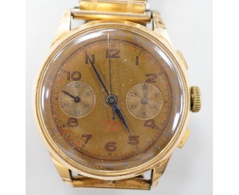 A 1950's? Swiss 18k chronograph manual wind wrist watch, on later associated flexible bracelet.