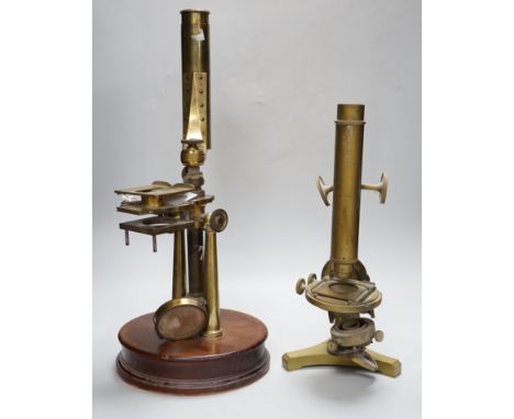 Three antique brass microscopes, one stamped R &amp; J Beck London &amp; Philadelphia, 37cm high
