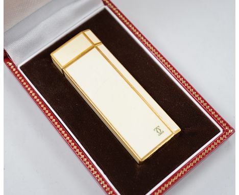 A cased Cartier cigarette lighter