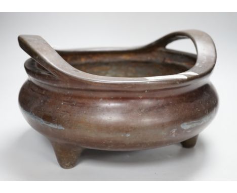 A large Chinese bronze censer, 30cm wide