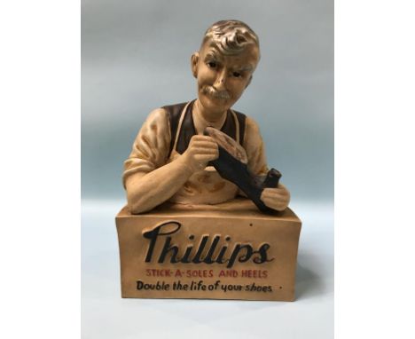 Advertising; 'Phillips, Stick-A Soles and Heels, Double the Life of your Shoes', a shop counter advertising figure, 30cm heig