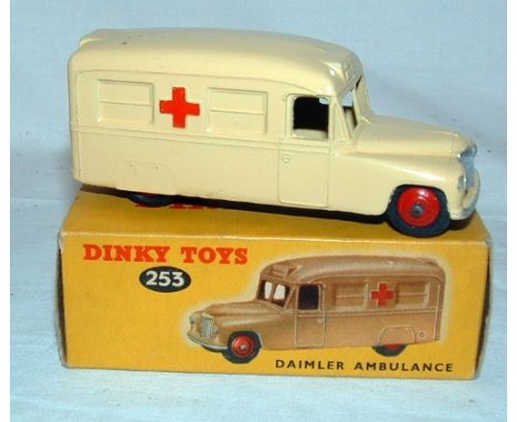 DINKY Toys 253 Cream Daimler Ambulance with Red ridged Hubs. Excellent Plus in an Excellent Box which could be improved with 