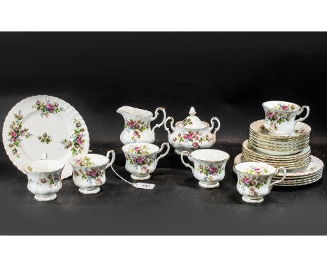 Royal Albert 'Moss Rose' Tea Service, comprising six cup, saucers and side plates, and six sandwich/cake plates, together wit