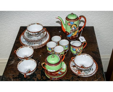 Two Japanese Tea Sets, comprising an eggshell tea set with a tea pot, sugar bowl, milk jug, four cups and saucers in a bright