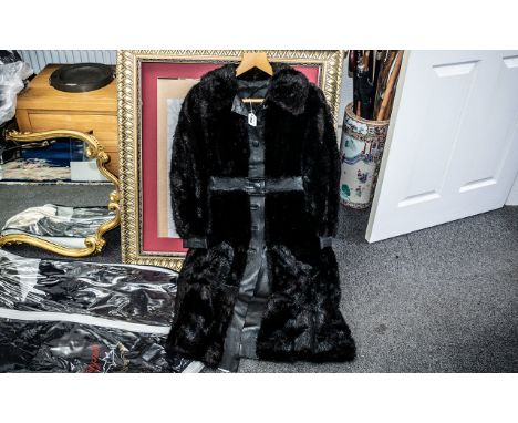 Ladies Black Mink &amp; Leather Full Length Coat, with leather placket, waistband and cuffs.  Button fastening, made by Maxwe
