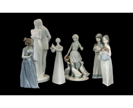 A Collection of Figures to include two Royal Doulton HN 2470 'Peace' and HN 3254 'Happy Anniversary', together with 3 Nao fig