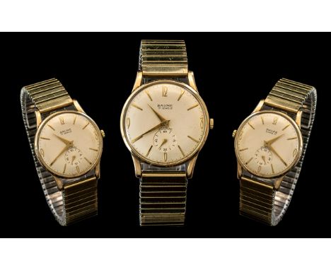 Gents 9ct Gold Baume Wristwatch Cream Dial with baton &amp; Arabic numerals plus subsidiary seconds. 33mm, and with a 9ct gol