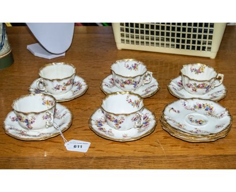 Osler Calcutta Set comprising five teacups and eight saucers, with decorative pattern.