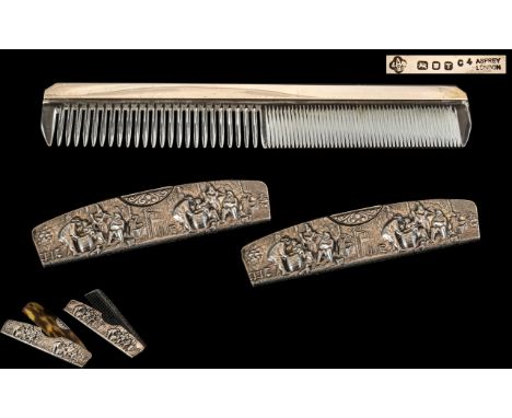An Asprey Silver Backed Comb, fully hallmarked for London T 1954.  Length 7".  Together with two further combs in Dutch silve