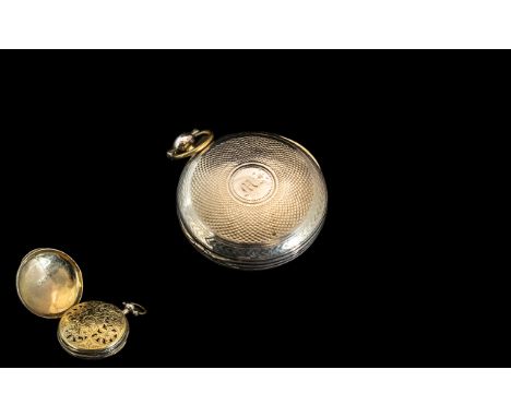 A Ladies Georgian Silver Vinaigrette, in the form of a pocket watch with engine turned case, gilt pierced grill, fully hallma