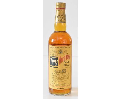 White Horse Scotch Whisky 1 bottle White Horse Scotch Whisky 70°proof from early 1960’s Registration No. GD 5651033.Qty: 1Wil