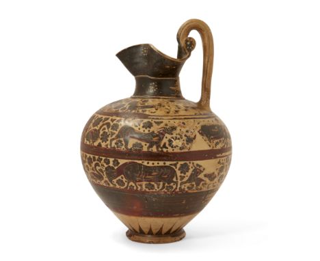 A large Corinthian trefoil-lipped oinochoe Late 7th – early 6th Century B.C. with an animal frieze, decorated in three regist