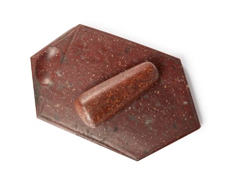 A porphyry artist's palette and associated pestle,  India, 19th century or earlierOf hexagonal shape and deep red colour, the