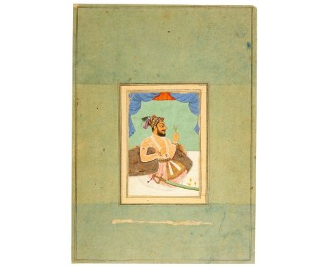 A detached album folio : seated portrait of Sultan ‘Ali Adil Shah II,  Bijapur, Deccan, India, 18th centuryOpaque pigments he