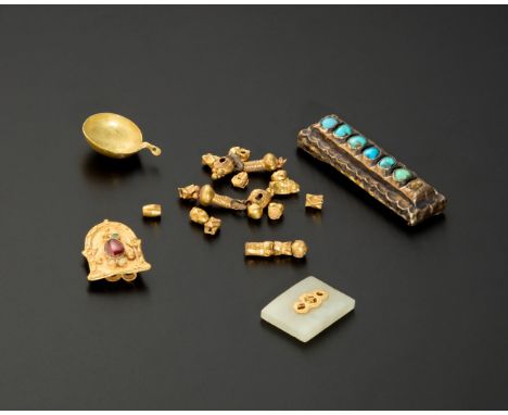 A group of gold jewellery elements,comprising a red stone set gold arch-shaped plaque; a gold cup pendant; a rectangular jade