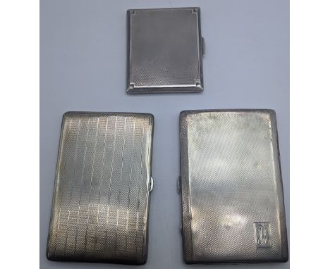 Three early 20th century Deco silver cigarette cases, engine turned outers, gilt interiors, Birmingham hallmarks, 424g (total